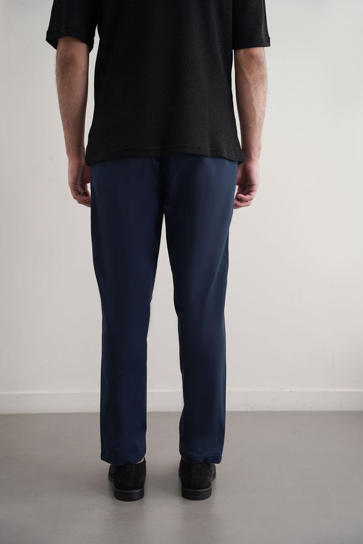 NAVY TAPERED CHINOS