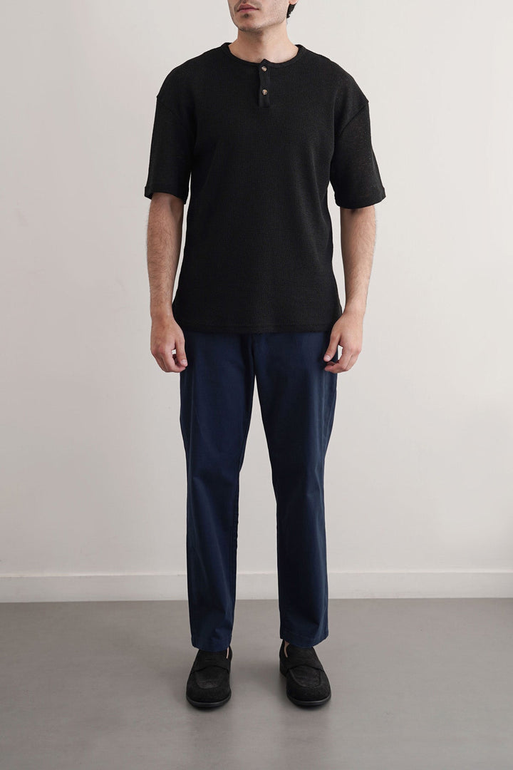 NAVY TAPERED CHINOS