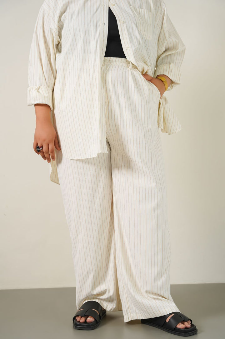 CREAM CURVE STRIPED PANTS