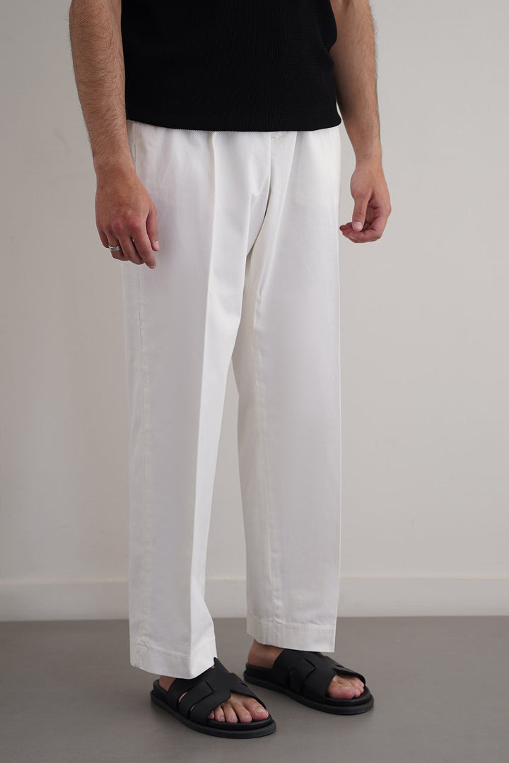 OFF WHITE PLEATED COTTON TROUSERS