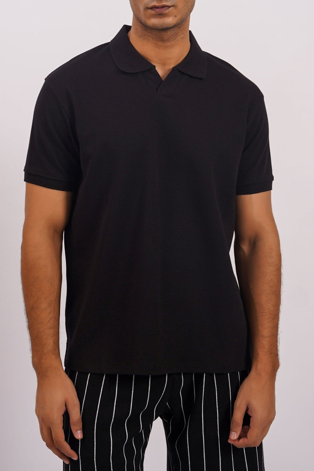 BLACK KNITTED POLO