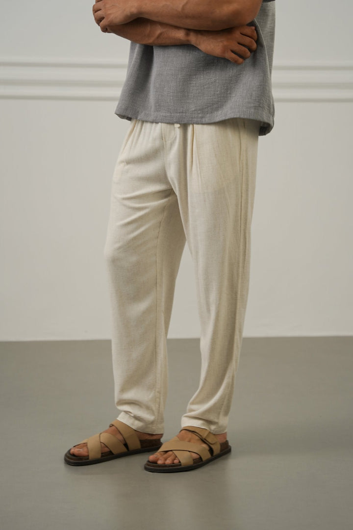 OFF WHITE FLOWY BLENDED LINEN TROUSERS
