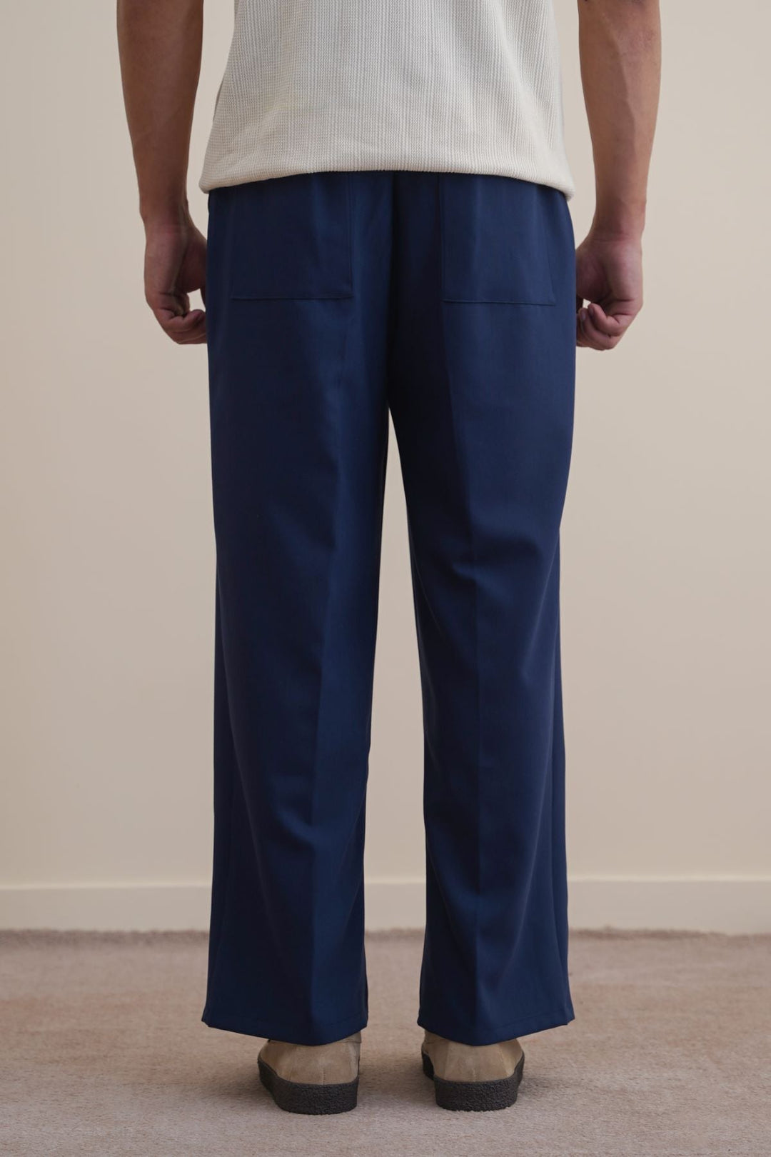 NAVY PLEATED PANTS