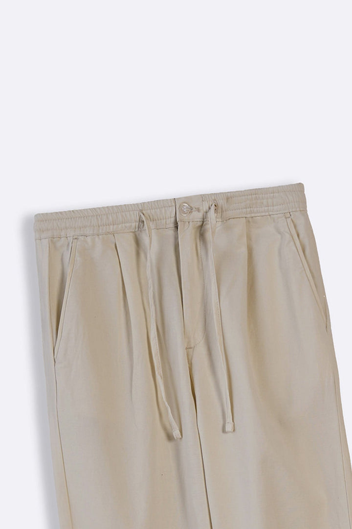 BEIGE EASY PLEATED PANTS