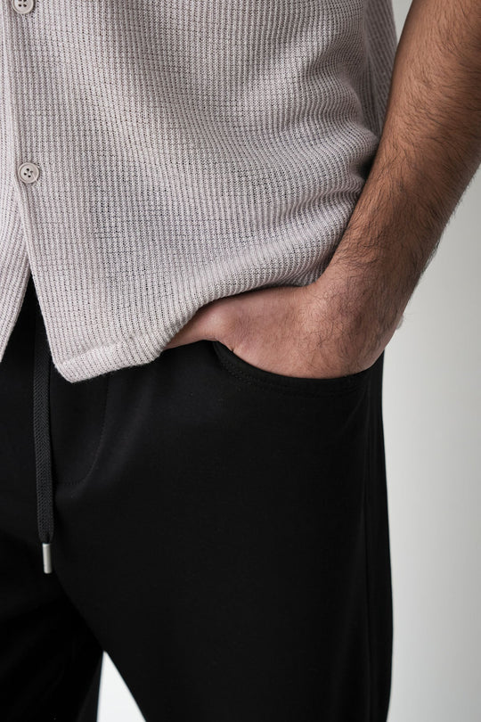 BLACK PANELLED TROUSERS