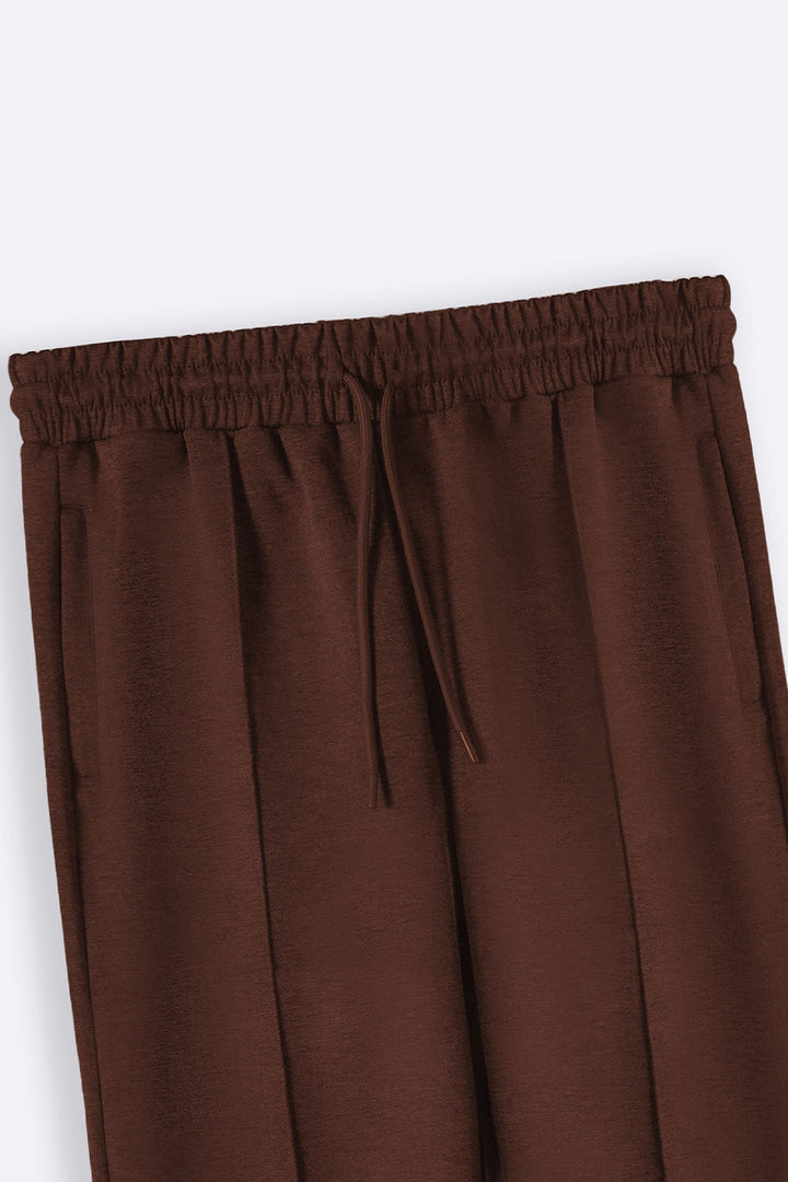 BROWN EASY PLEATED TROUSERS