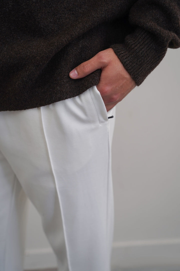 IVORY EASY PLEATED TROUSERS