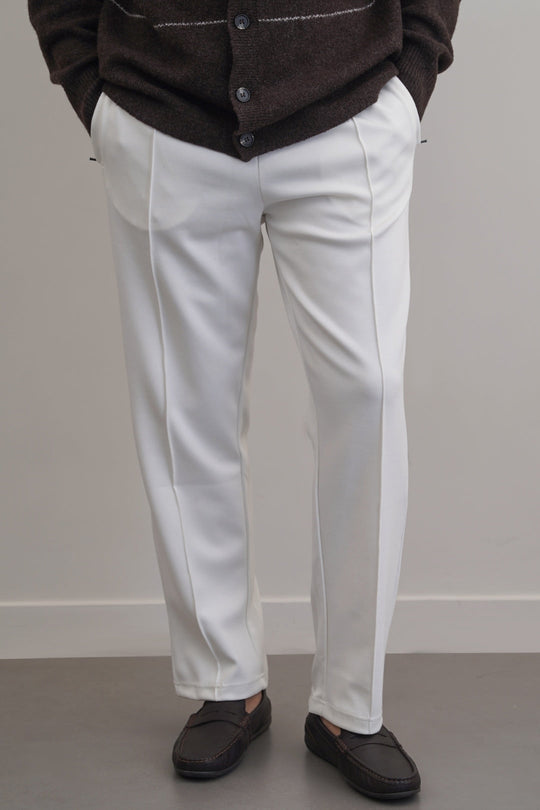 IVORY EASY PLEATED TROUSERS