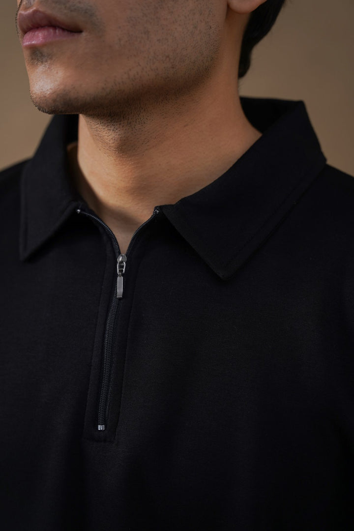 BLACK QUARTER-ZIP POLO
