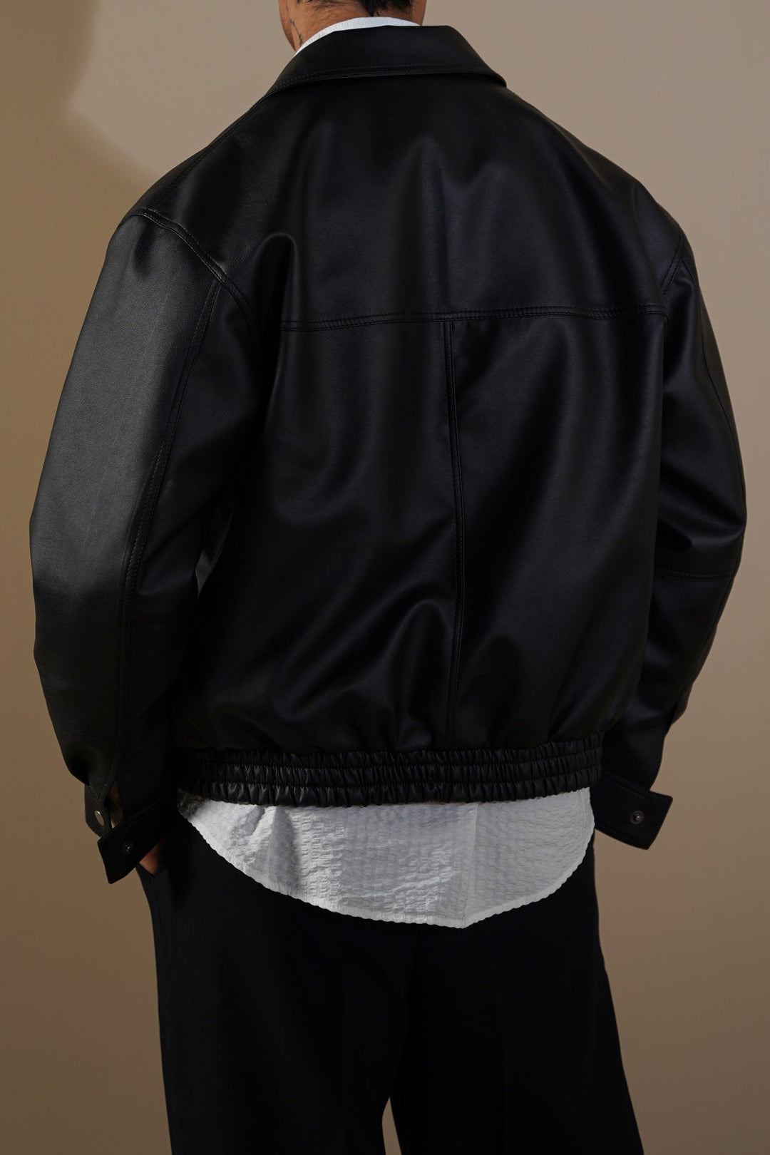 BLACK OVERSIZED FAUX LEATHER BOMBER