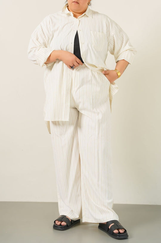 CREAM CURVE STRIPED PANTS