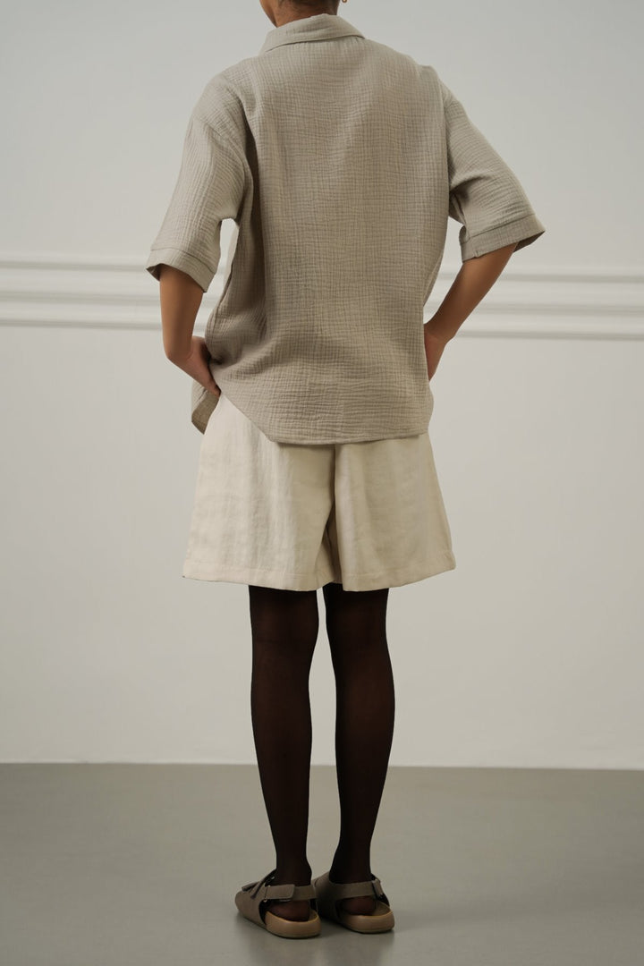 CREAM BELTED PLEAT SHORTS