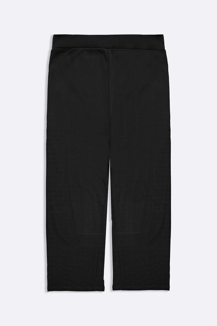 BLACK KNITTED BARREL PANTS