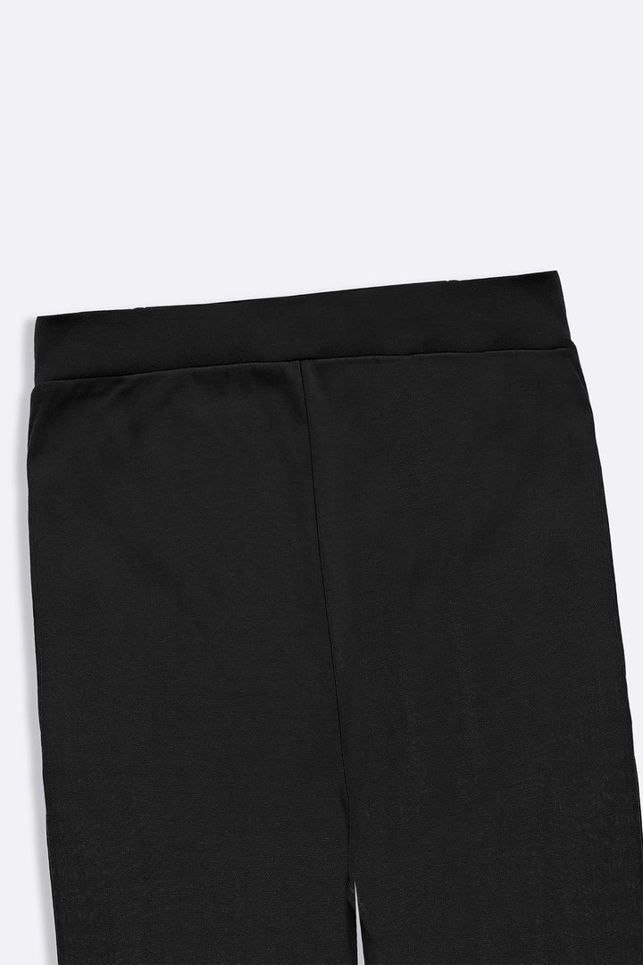 BLACK KNITTED BARREL PANTS