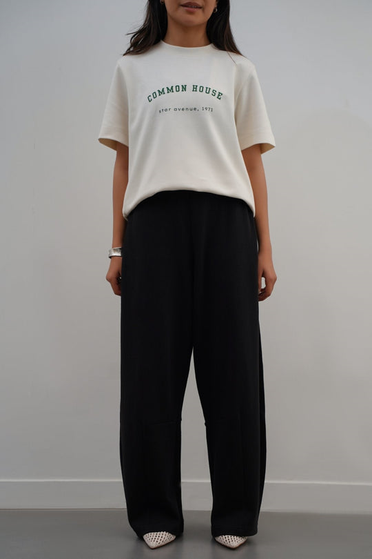 BLACK KNITTED BARREL PANTS