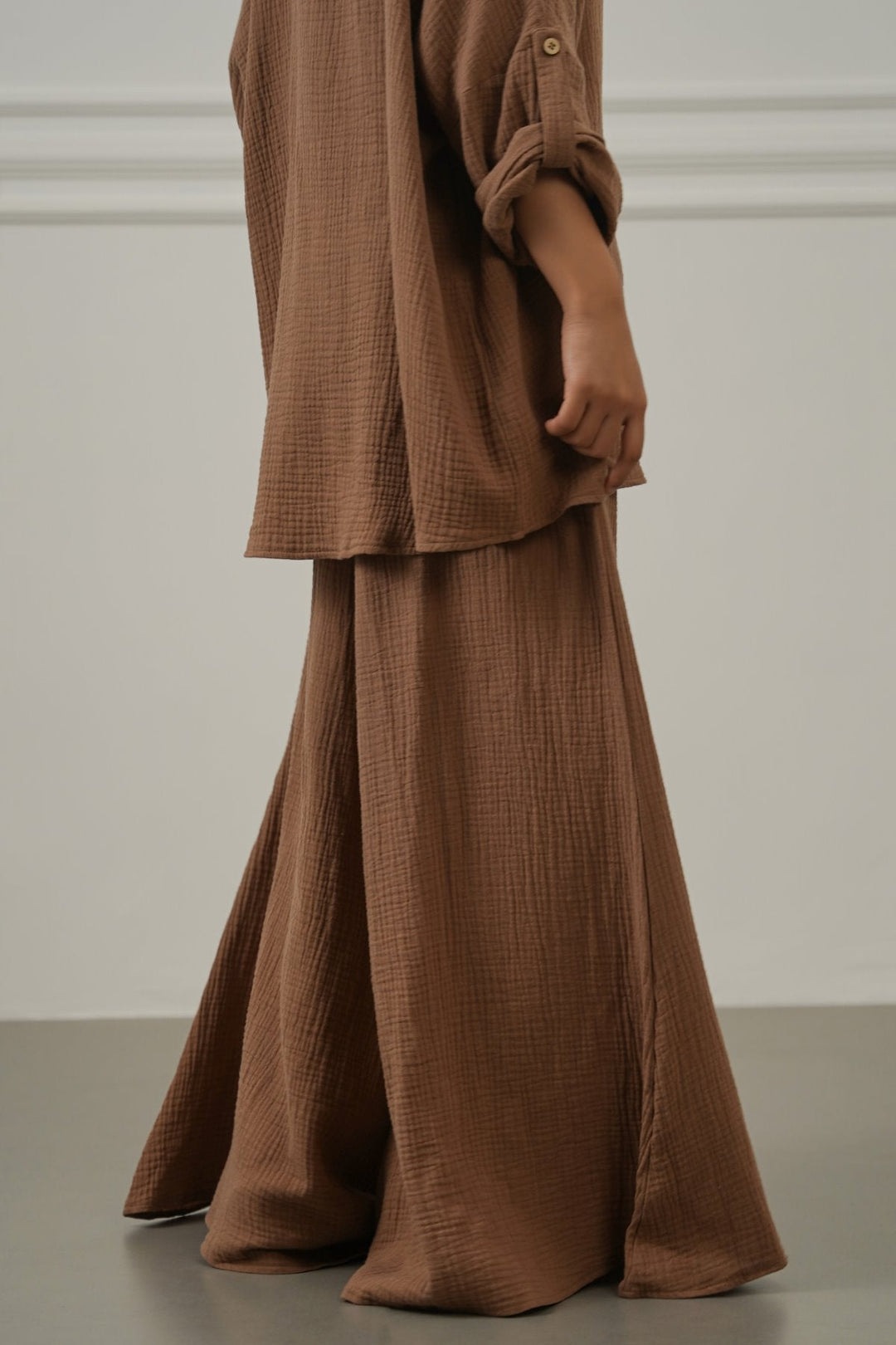 BROWN SMOCKED WAIST MUSLIN PANTS