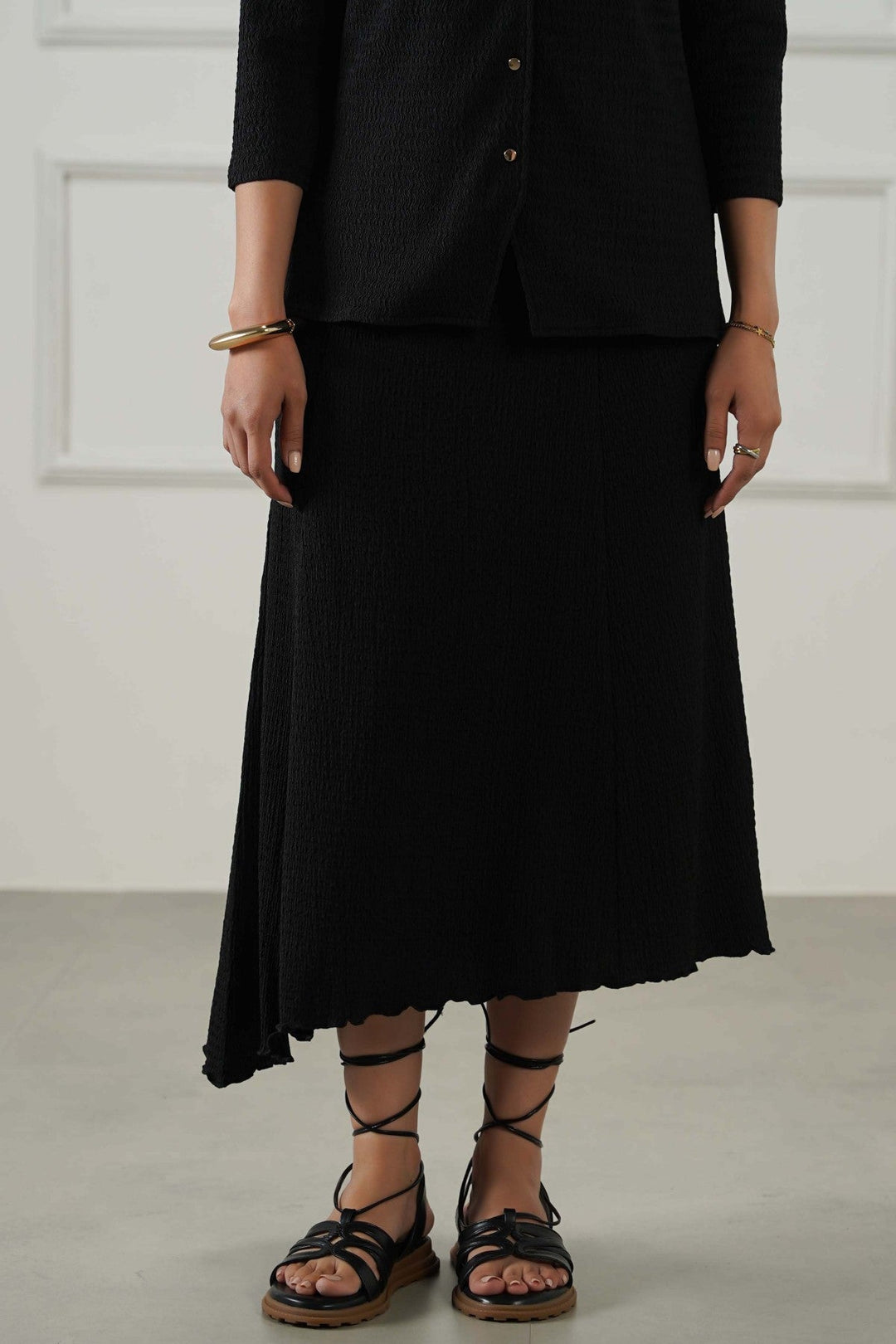 BLACK ASYMMETRIC CRINKLE SKIRT