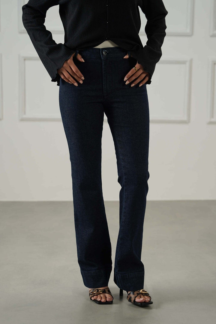 DARK BLUE MID-RISE KICK FLARE JEANS
