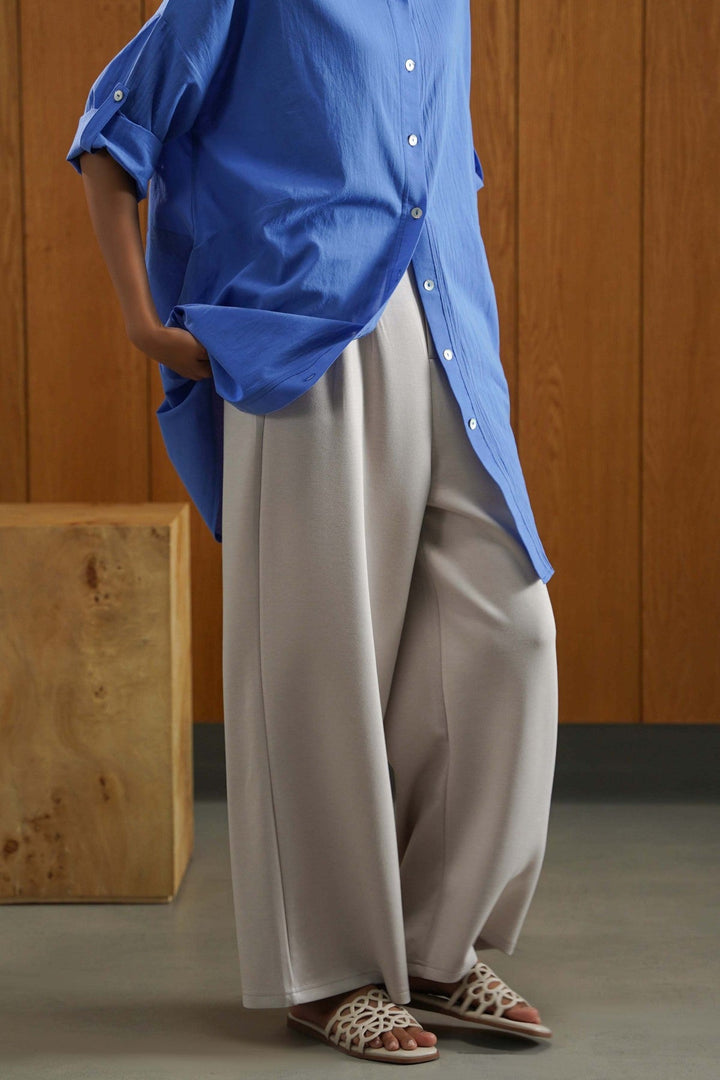 IVORY PLEATED WIDE-LEG PANTS
