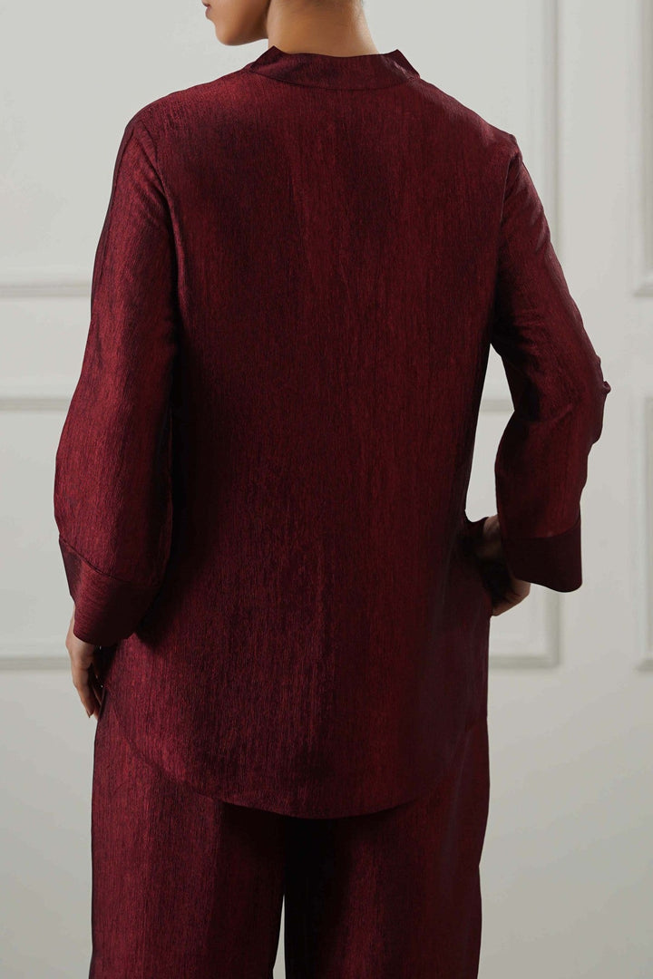 RUST TEXTURED FLOWY V NECK TOP