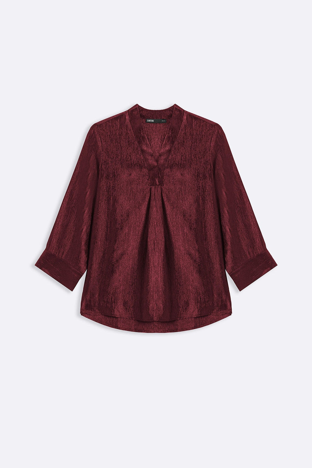 RUST TEXTURED FLOWY V NECK TOP