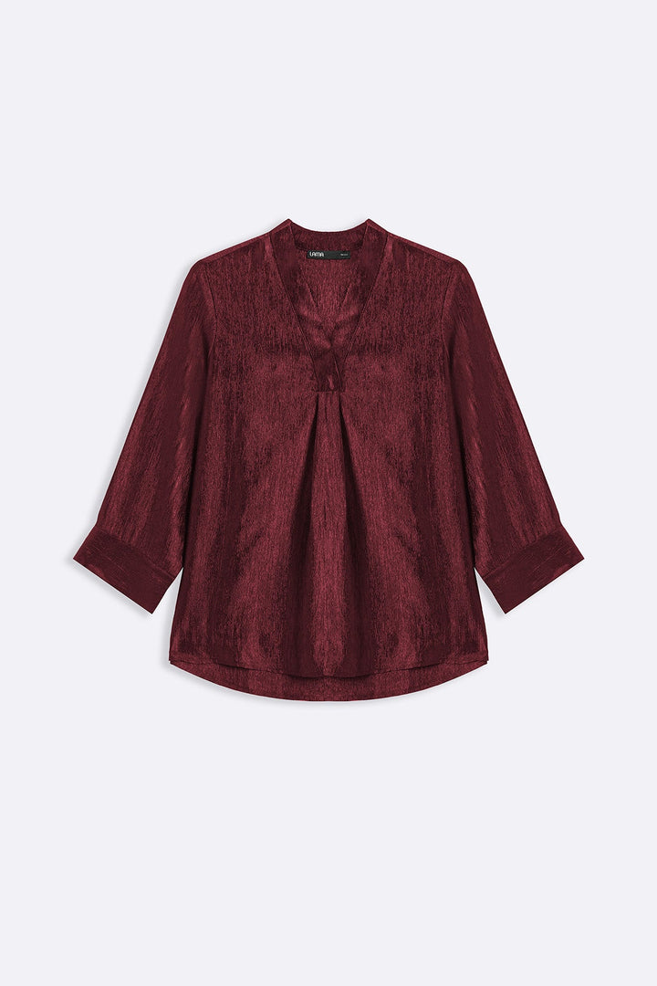 RUST TEXTURED FLOWY V NECK TOP