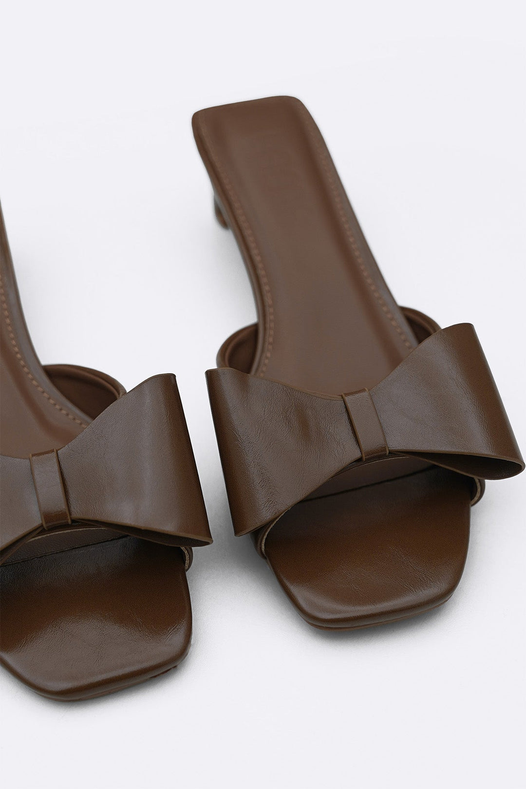BROWN BOWIE BOW HEELS