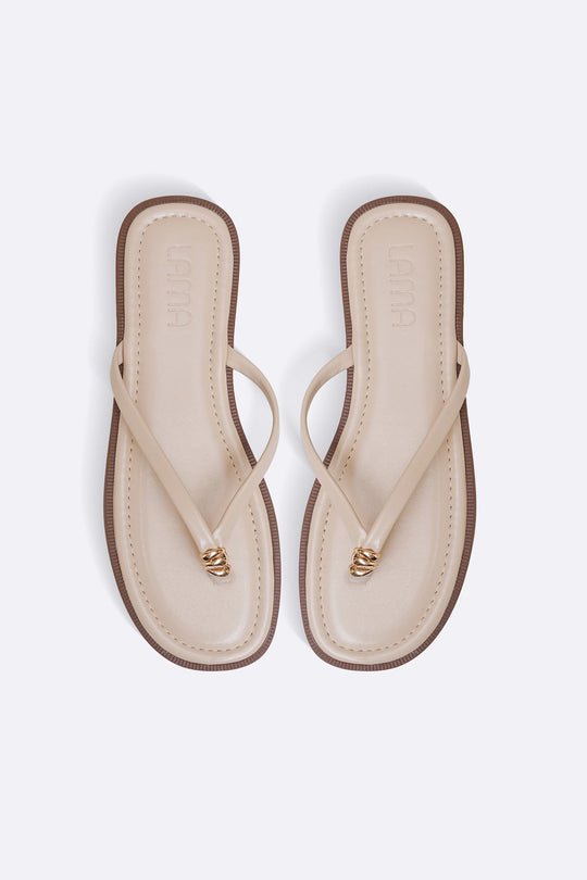 BEIGE STUD STUFF FLIP FLOPS
