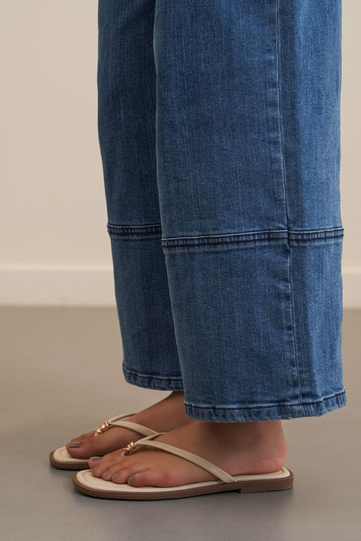 BEIGE STUD STUFF FLIP FLOPS