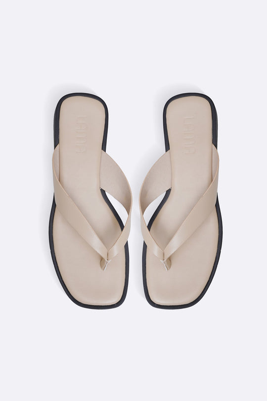 BEIGE MAGAZINE FLIP FLOPS