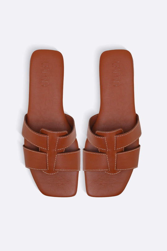 TAN CUSHIONED STITCH SLIDES