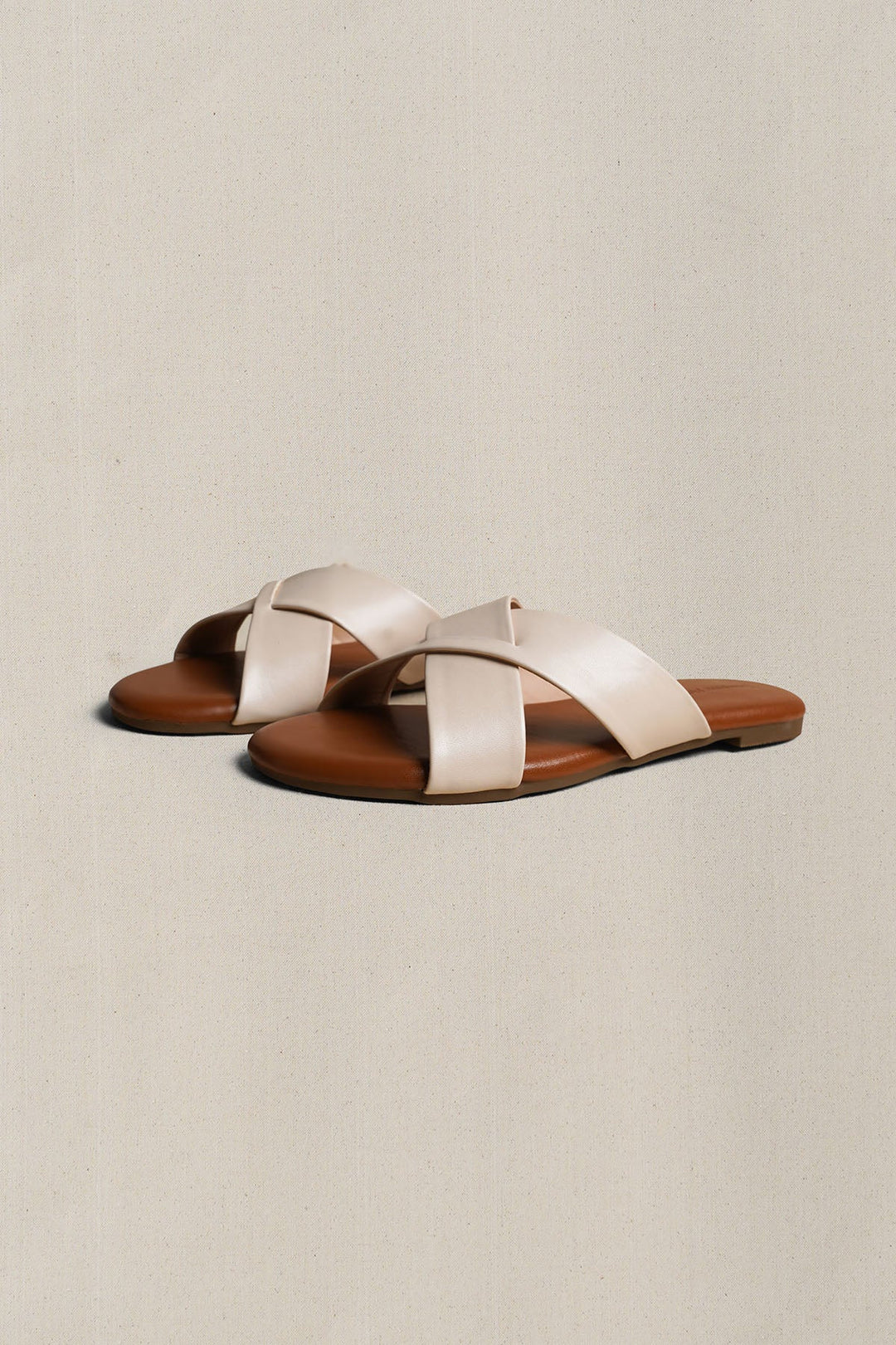 OFF WHITE CROSS STRAP SLIDES
